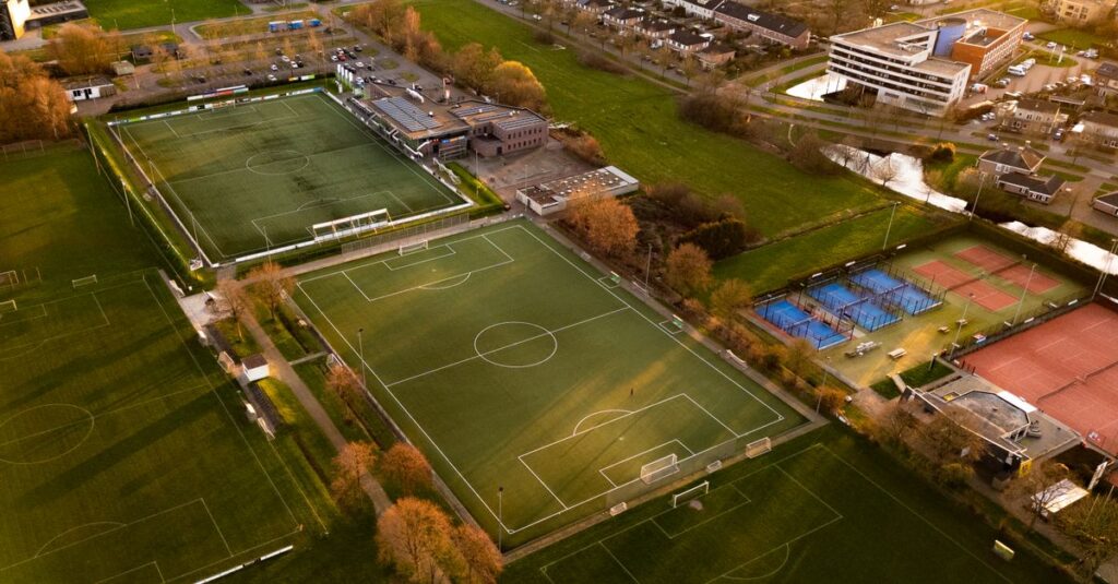 Aerial shot of sports fields and courts in Hoogeveen, Nederland at sunset.
