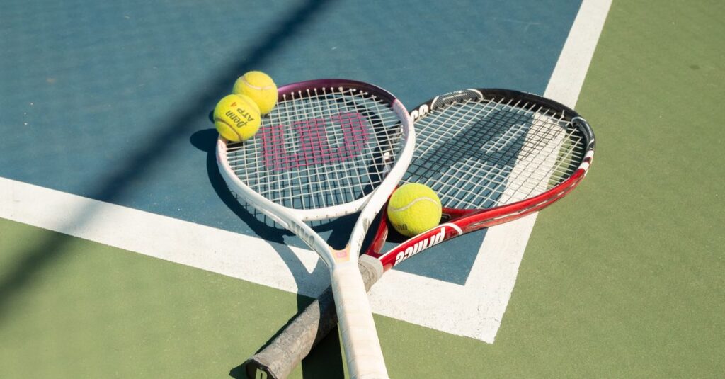 Tennis rackets and balls on a sunny outdoor court in San Francisco.