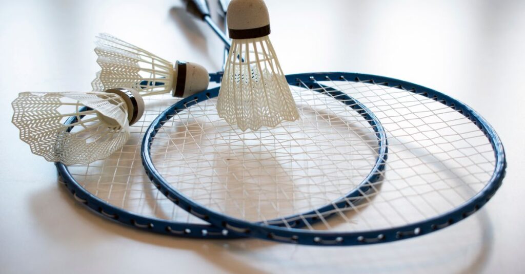 Vibrant image of badminton rackets and shuttlecocks, perfect for sports themes.