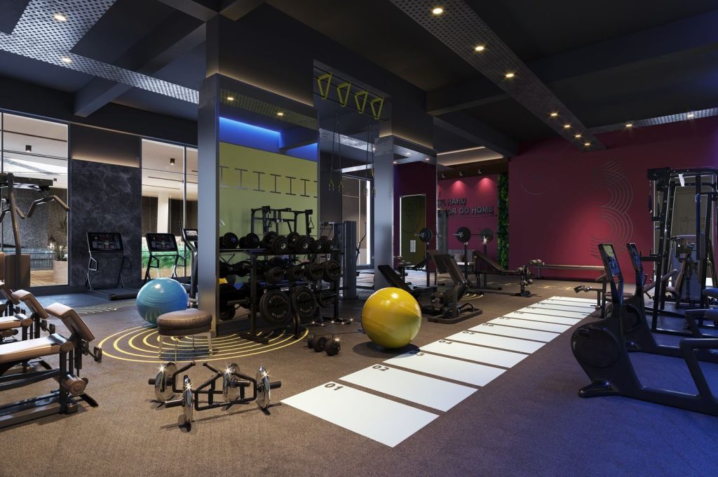 Spacious gym interior showcasing equipment for exercise and fitness training.