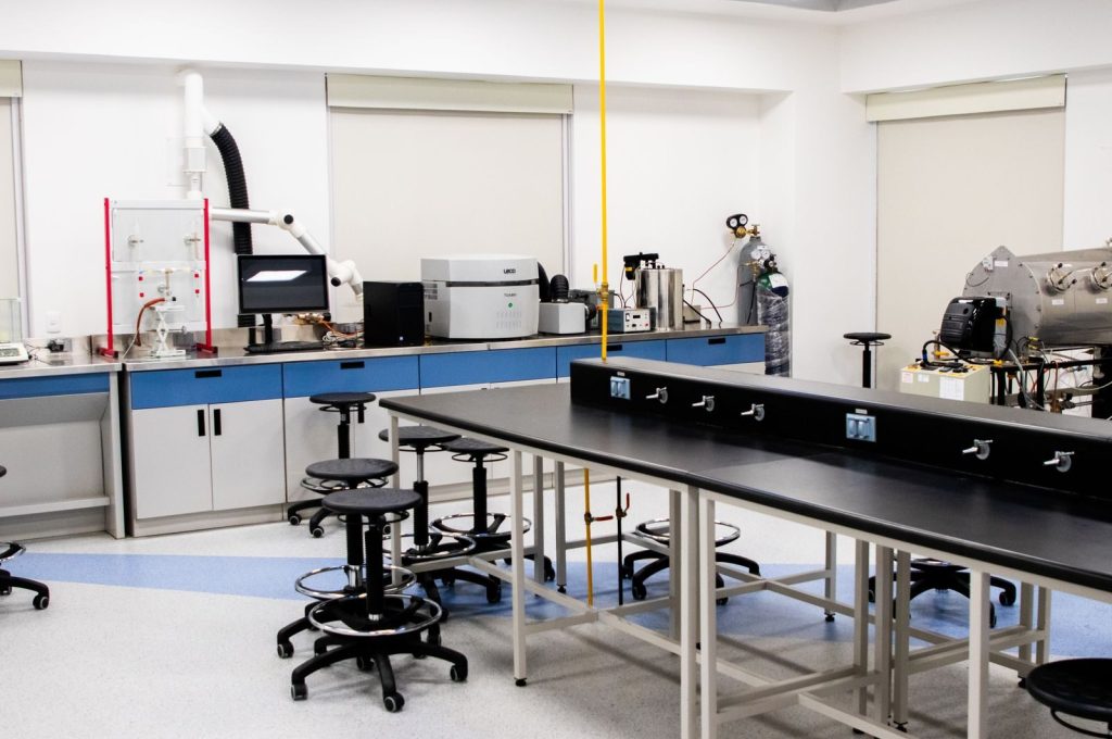 Spacious research laboratory interior with advanced equipment and modern furnishings.