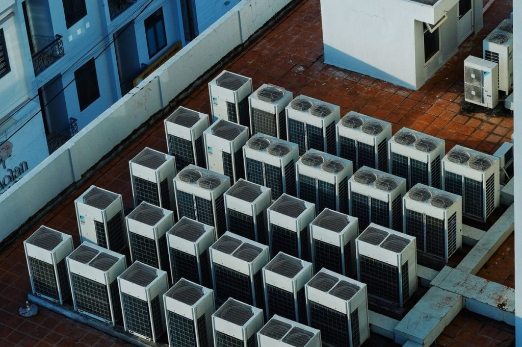 High angle view of rooftop HVAC units on a building in Buon Ma Thuot, Vietnam.